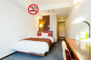 Postel nebo postele na pokoji v ubytování Sky Heart Hotel Koiwa