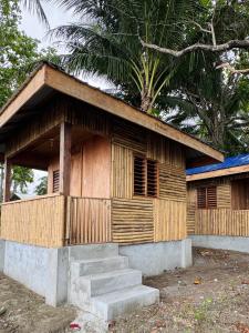 a small building with steps in front of it at Payapa Beach in Aborlan +22 photos
