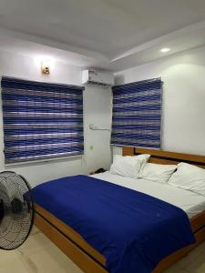 Postel nebo postele na pokoji v ubytování 501 Aparthotel