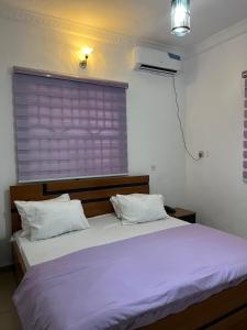 Postel nebo postele na pokoji v ubytování 501 Aparthotel