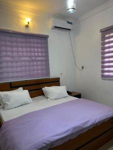 Postel nebo postele na pokoji v ubytování 501 Aparthotel