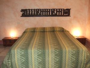 Letto o letti in una camera di Agriturismo QuartoPodere