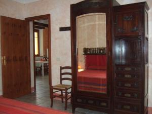 Letto o letti in una camera di Agriturismo QuartoPodere