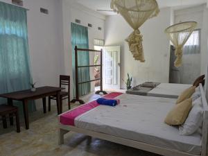 Una cama o camas en una habitación de Villa Green House