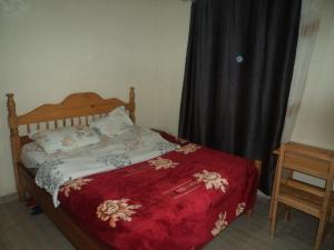 Ένα ή περισσότερα κρεβάτια σε δωμάτιο στο Best Home GuestHouse Musanze