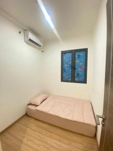 Postel nebo postele na pokoji v ubytování Skyhouse bsd