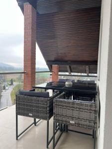 Larisa apartma的阳台或露台