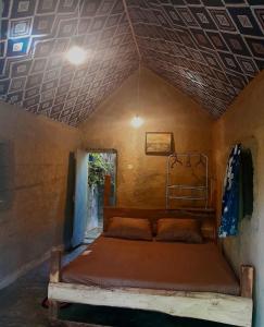 Postel nebo postele na pokoji v ubytování Eco Retreat