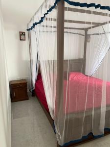 Postel nebo postele na pokoji v ubytování Garden Villa