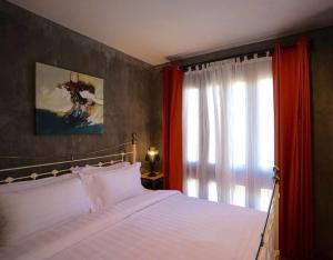 เตียงในห้องที่ House Of Passion Amphawa +37 ภาพ