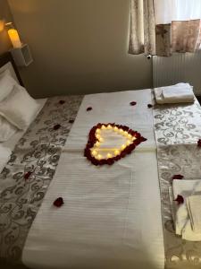 Postel nebo postele na pokoji v ubytování Hotel Zenubia