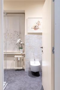 Ένα μπάνιο στο Eleganza sabauda 120 sqm Luxury historical flat +39 φωτογραφίες