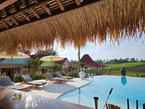 Bazén v ubytování United Colors of Bali Nature nebo v jeho okolí