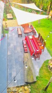 a group of tables and chairs under a white tent at BIRD HOUSE resort in Hữu Biêt