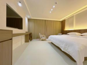 TV/trung tâm giải trí tại Zhangjiajie JoyMaple Hotel