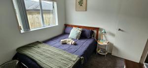 Una cama o camas en una habitación de Flatbush Center point