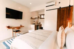 Μια τηλεόραση ή/και κέντρο ψυχαγωγίας στο Kanela Villas Lombok