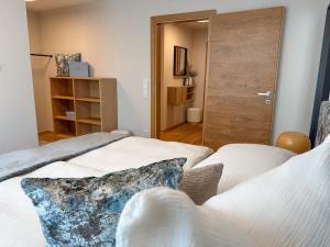 Posezení v ubytování "THREE" - Premium Apartments Seekirchen, modern, zentral gelegen