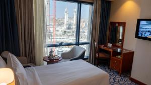 Postel nebo postele na pokoji v ubytování فندق الصفوة البرج الأول Al Safwah Hotel First Tower 1
