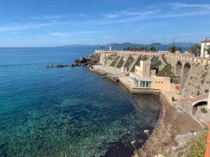 an aerial view of the ocean next to a bridge at Marina 15 rooms no cucina in Piombino