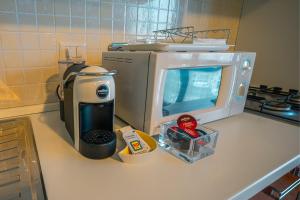 Kuchyň nebo kuchyňský kout v ubytování Turin Airport premium apartment G