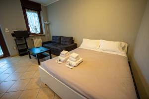 Postel nebo postele na pokoji v ubytování Turin Airport premium apartment G