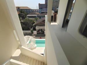 Balkón nebo terasa v ubytování Happy House 芭提雅开心居