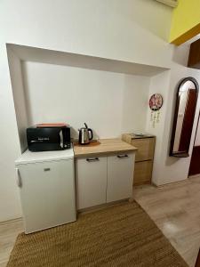 Kuchyňa alebo kuchynka v ubytovaní Apartmán A Luhačovice