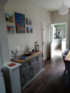 a kitchen with a large island in a room at Pankhurst, Louth in Louth