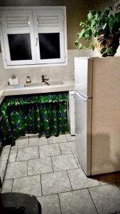 Η κουζίνα ή μικρή κουζίνα στο Le Lys de la paix