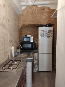 Kuchyň nebo kuchyňský kout v ubytování Casa Cueva