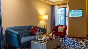 TV a/nebo společenská místnost v ubytování فندق الصفوة البرج الأول Al Safwah Hotel First Tower 1