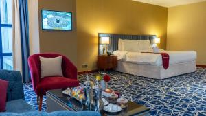 Postel nebo postele na pokoji v ubytování فندق الصفوة البرج الأول Al Safwah Hotel First Tower 1