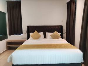BIG TREE HOTEL客房内的一张或多张床位
