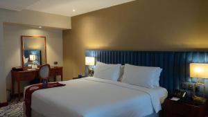 Postel nebo postele na pokoji v ubytování فندق الصفوة البرج الأول Al Safwah Hotel First Tower 1