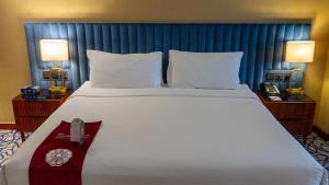Postel nebo postele na pokoji v ubytování فندق الصفوة البرج الأول Al Safwah Hotel First Tower 1