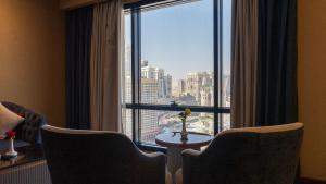 Posezení v ubytování فندق الصفوة البرج الأول Al Safwah Hotel First Tower 1