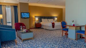 Postel nebo postele na pokoji v ubytování فندق الصفوة البرج الأول Al Safwah Hotel First Tower 1