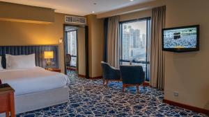 Postel nebo postele na pokoji v ubytování فندق الصفوة البرج الأول Al Safwah Hotel First Tower 1