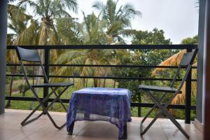 En balkon eller terrasse på Urumaya Resort & Eco Farm