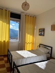 Postel nebo postele na pokoji v ubytování Hotel Al Manar