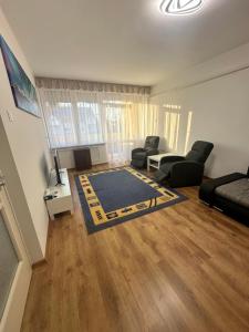 a living room with a couch and a table at Bende-lak in Nyíregyháza