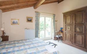 Postel nebo postele na pokoji v ubytování Villa Monia