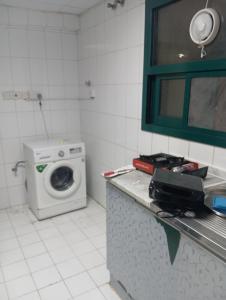 Kuchyň nebo kuchyňský kout v ubytování Your friendly home room