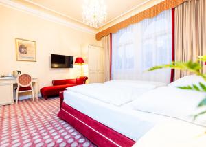Postel nebo postele na pokoji v ubytování Aviano Boutique Hotel