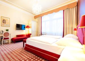 Postel nebo postele na pokoji v ubytování Aviano Boutique Hotel