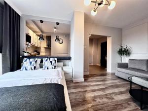 Posteľ alebo postele v izbe v ubytovaní Airport Apartment Warszawa