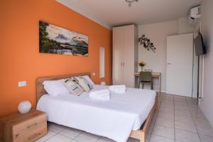 Ένα ή περισσότερα κρεβάτια σε δωμάτιο στο Girasole Suite Leonardo Academy, MXP & Lakes