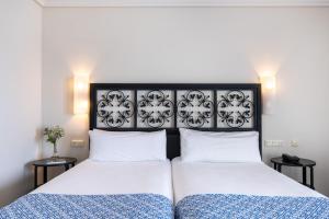 Cama o camas de una habitación en Parador de Málaga Gibralfaro