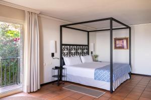 Cama o camas de una habitación en Parador de Málaga Gibralfaro